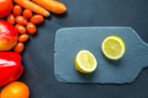 Sliced Lemon on Blue Chopping Board